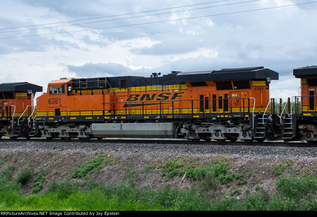 BNSF 6381 trails on a westbound manifest